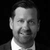 En profilbild av fastighetsmäklare Rickard Bornesand