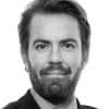 En profilbild av fastighetsmäklare Fredrik Sangberg