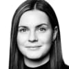 En profilbild av fastighetsmäklare Sandra Lindh