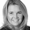 En profilbild av fastighetsmäklare Annelie Svelander