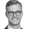 En profilbild av fastighetsmäklare Erik Svensson