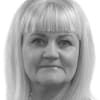 En profilbild av fastighetsmäklare Christel Kulle Mårtensson