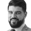 En profilbild av fastighetsmäklare Behrang Jamal