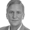 En profilbild av fastighetsmäklare Henrik Hansson