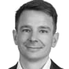 En profilbild av fastighetsmäklare Erik Wallström