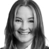 En profilbild av fastighetsmäklare Sandra Apelqvist