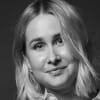En profilbild av fastighetsmäklare Camilla Andersson