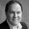 En profilbild av fastighetsmäklare Daniel Ollhage
