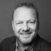 En profilbild av fastighetsmäklare Erik Olofsson