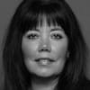 En profilbild av fastighetsmäklare Maria Björkman