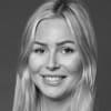 En profilbild av fastighetsmäklare Louise Sundberg