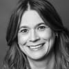 En profilbild av fastighetsmäklare Maria Hoppstadius