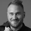 En profilbild av fastighetsmäklare Christoffer Johansson