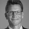 En profilbild av fastighetsmäklare Hans Edmark