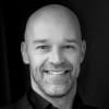 En profilbild av fastighetsmäklare Marko Åslund