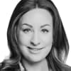 En profilbild av fastighetsmäklare Nina Lundström