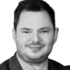 En profilbild av fastighetsmäklare Erik Andréasson Yde