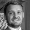 En profilbild av fastighetsmäklare Staffan Fritzell