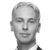 En profilbild av fastighetsmäklare Timmy Heiskanen