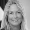 En profilbild av fastighetsmäklare Gunilla Hedman