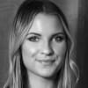 En profilbild av fastighetsmäklare Julia Nordin