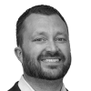 En profilbild av fastighetsmäklare Nicklas Häll