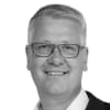 En profilbild av fastighetsmäklare Christian Nilsson