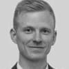 En profilbild av fastighetsmäklare Johan Söderlund