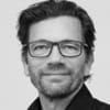 En profilbild av fastighetsmäklare Kristofer Lönnå