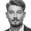 En profilbild av fastighetsmäklare Robert Sundström