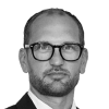 En profilbild av fastighetsmäklare Peter Forsling