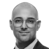 En profilbild av fastighetsmäklare Victor Aghester