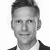En profilbild av fastighetsmäklare Mattias Östberg