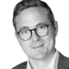 En profilbild av fastighetsmäklare Mikael Österling