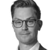 En profilbild av fastighetsmäklare Andreas Stiglund