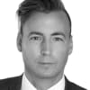 En profilbild av fastighetsmäklare Martin Lundmark