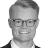 En profilbild av fastighetsmäklare Pontus Pärson