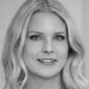 En profilbild av fastighetsmäklare Frida Rundberg