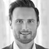 En profilbild av fastighetsmäklare Fredrik Öjdahl