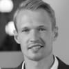 En profilbild av fastighetsmäklare Daniel Werdien