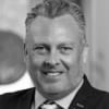 En profilbild av fastighetsmäklare Richard Lundblad