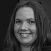 En profilbild av fastighetsmäklare Annica Svanberg