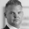 En profilbild av fastighetsmäklare Peter Reuterhagen