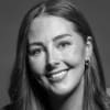 En profilbild av fastighetsmäklare Elin Eriksson