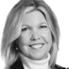 En profilbild av fastighetsmäklare Marika Greus