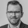 En profilbild av fastighetsmäklare Olle Löfberg