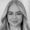 En profilbild av fastighetsmäklare Johanna Marcusson