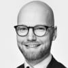 En profilbild av fastighetsmäklare Andreas Nordgren