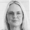 En profilbild av fastighetsmäklare Lena Broberg