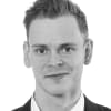 En profilbild av fastighetsmäklare Martin Rigvald